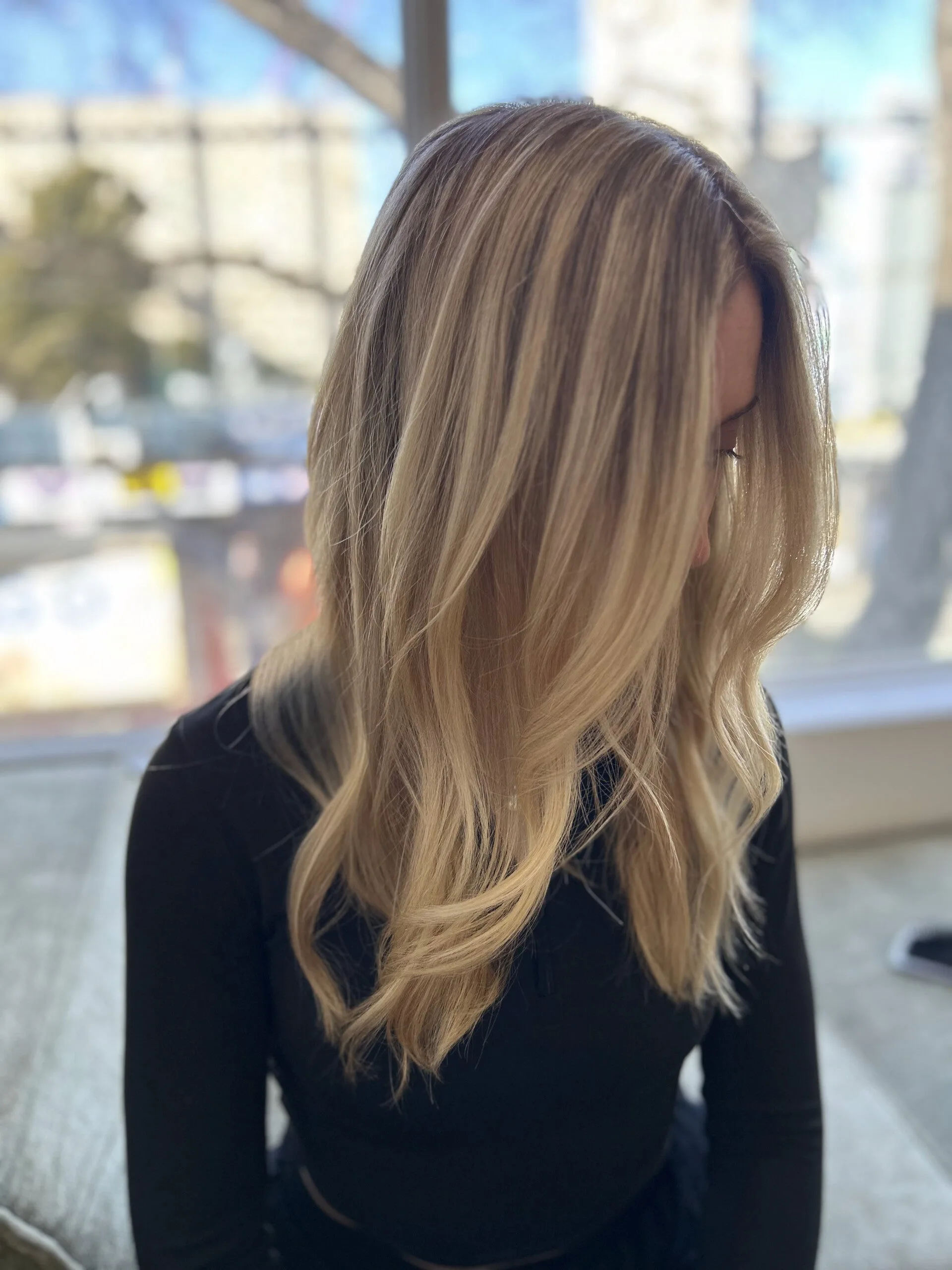Long golden-blonde balayage, back view