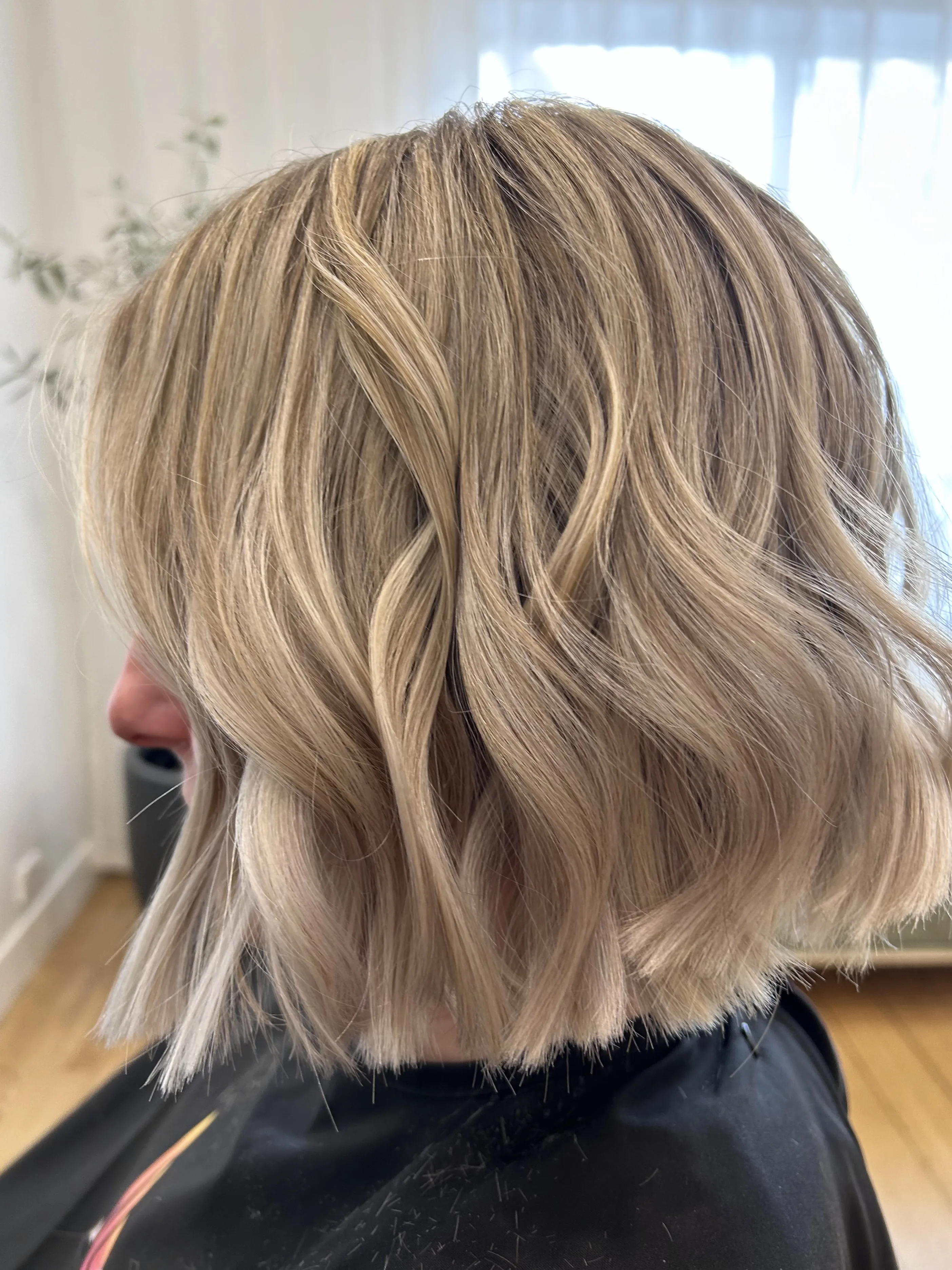 Cool-blonde textured bob, close back view